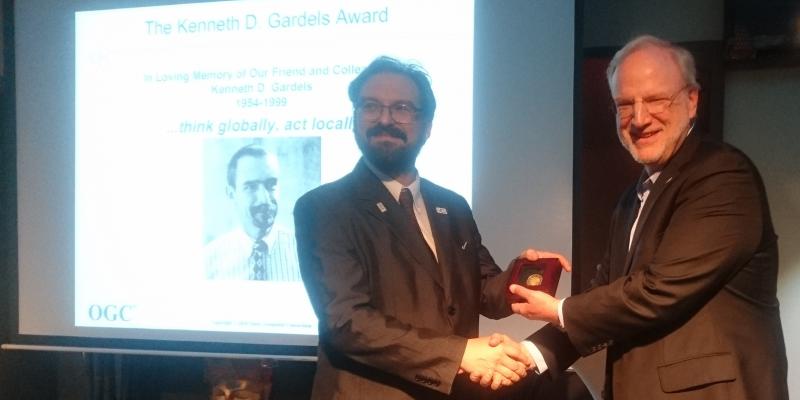 Joan Maso receiving OGC's 2018 Gardels Award from CEO and President Mark Reichardt 
