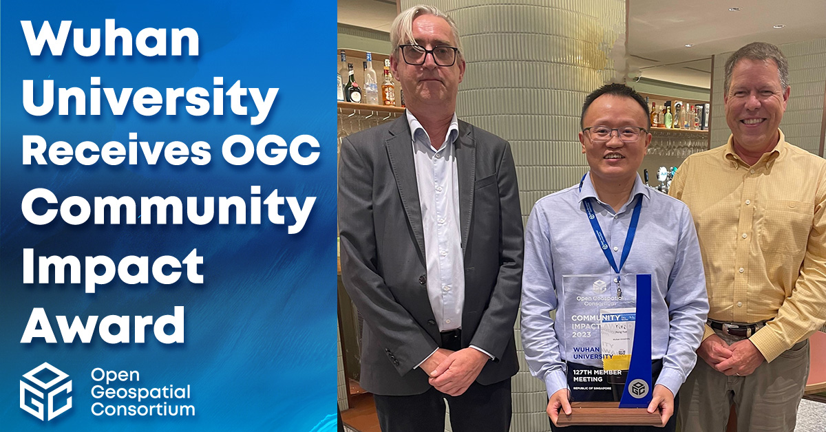 OGC Community Impact Award being presented to Wuhan University Professor Peng Yue by Trevor Taylor and Scott Simmons